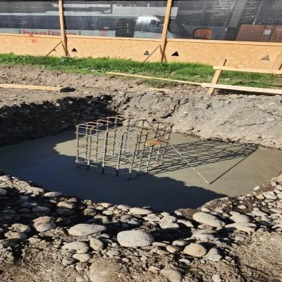 Base de hormigón con armadura metálica